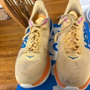 Hoka Vibrant Yellow and Orange Sneakers